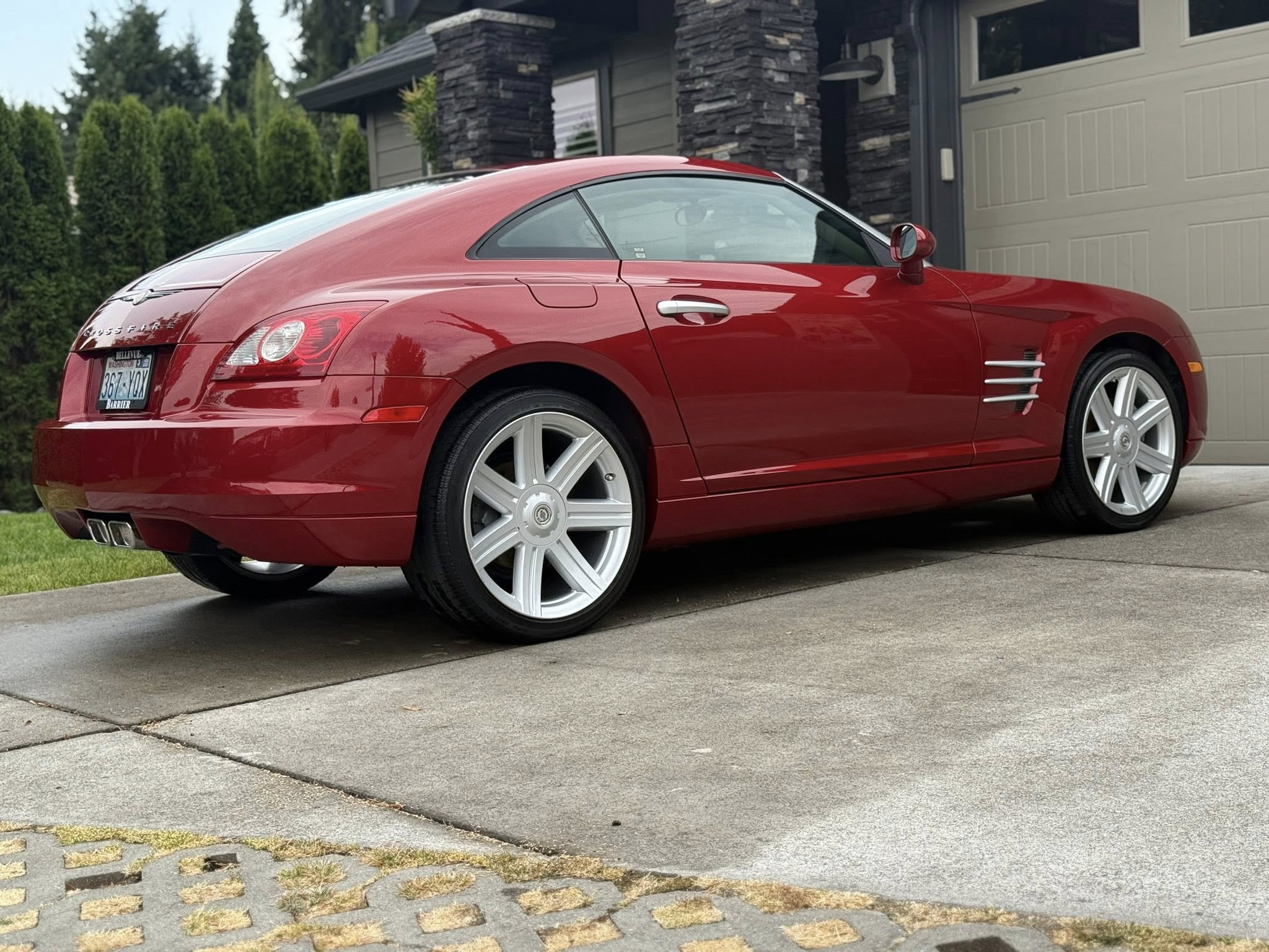Full side view of red car